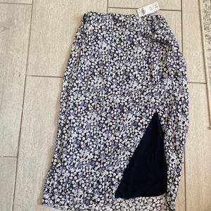 High waisted Mid length skirt. New with tags.